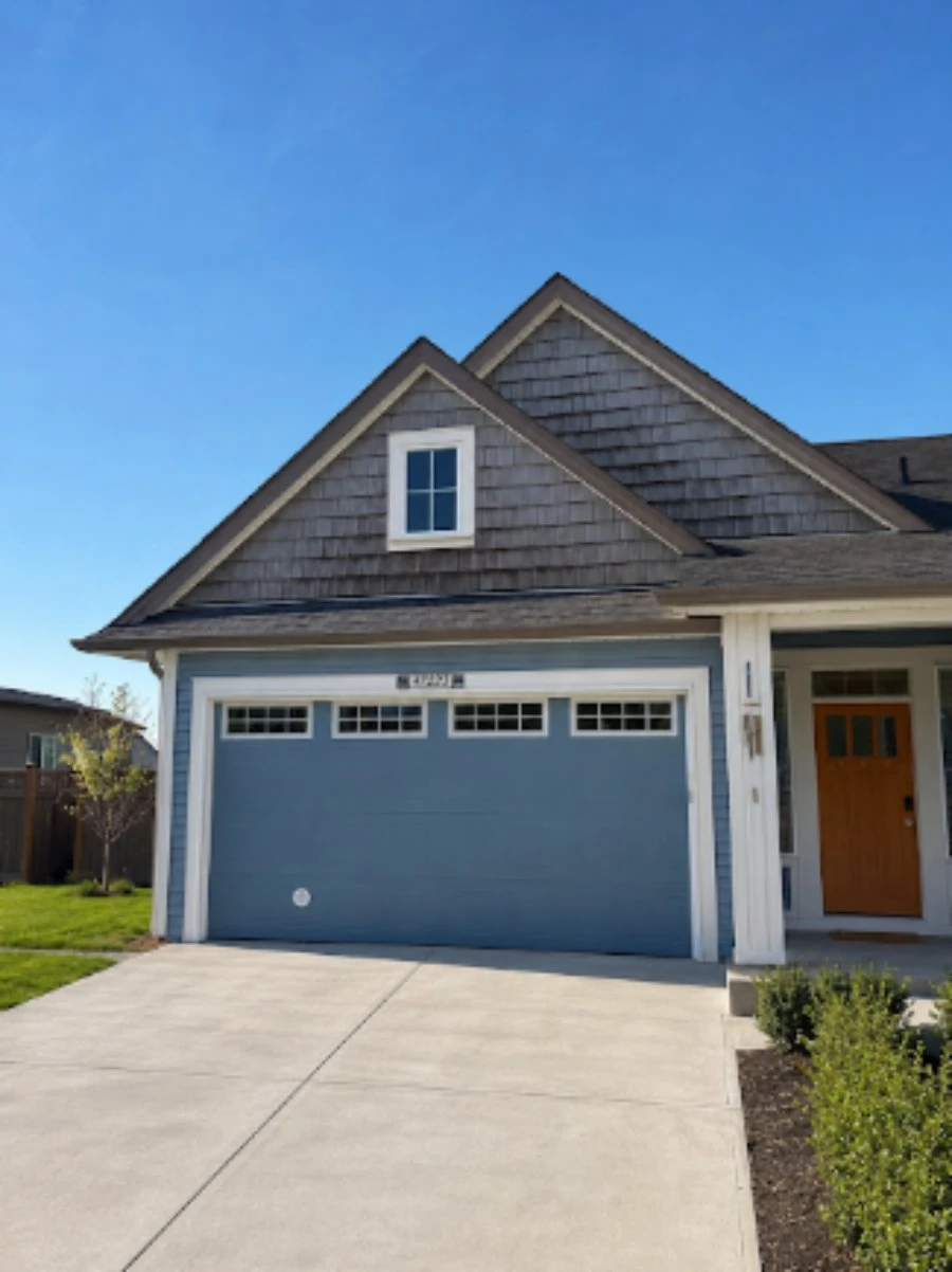 Two-storey home at night before permanent lights were installed