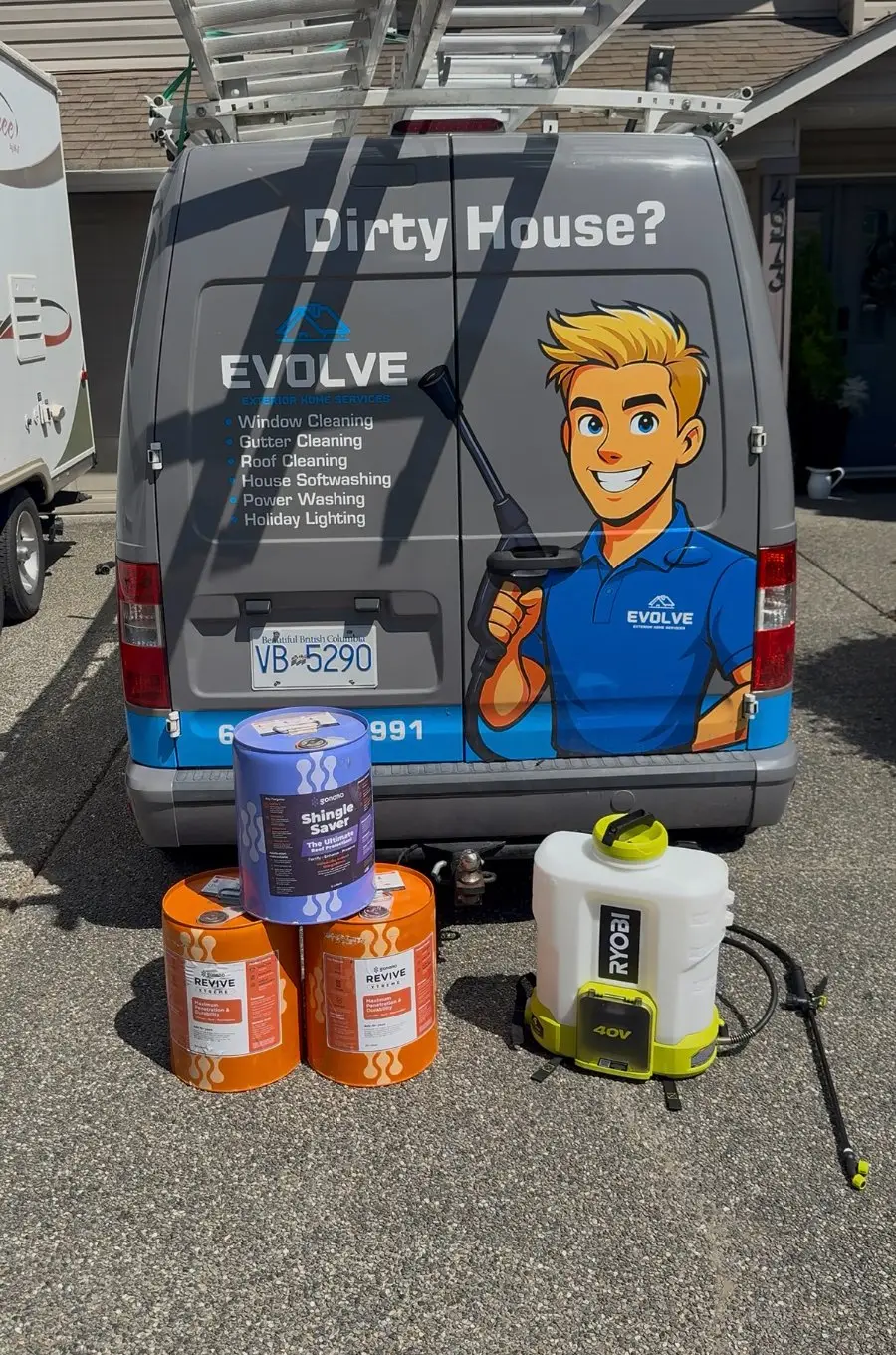 Evolve van with GoNano treatment containers and a pump sprayer in the driveway